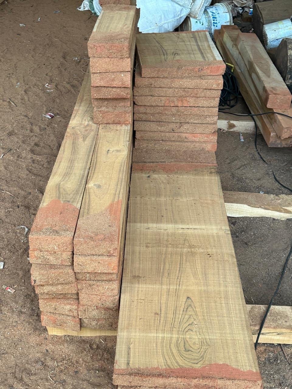 Freshly cut teak planks from the saw mill