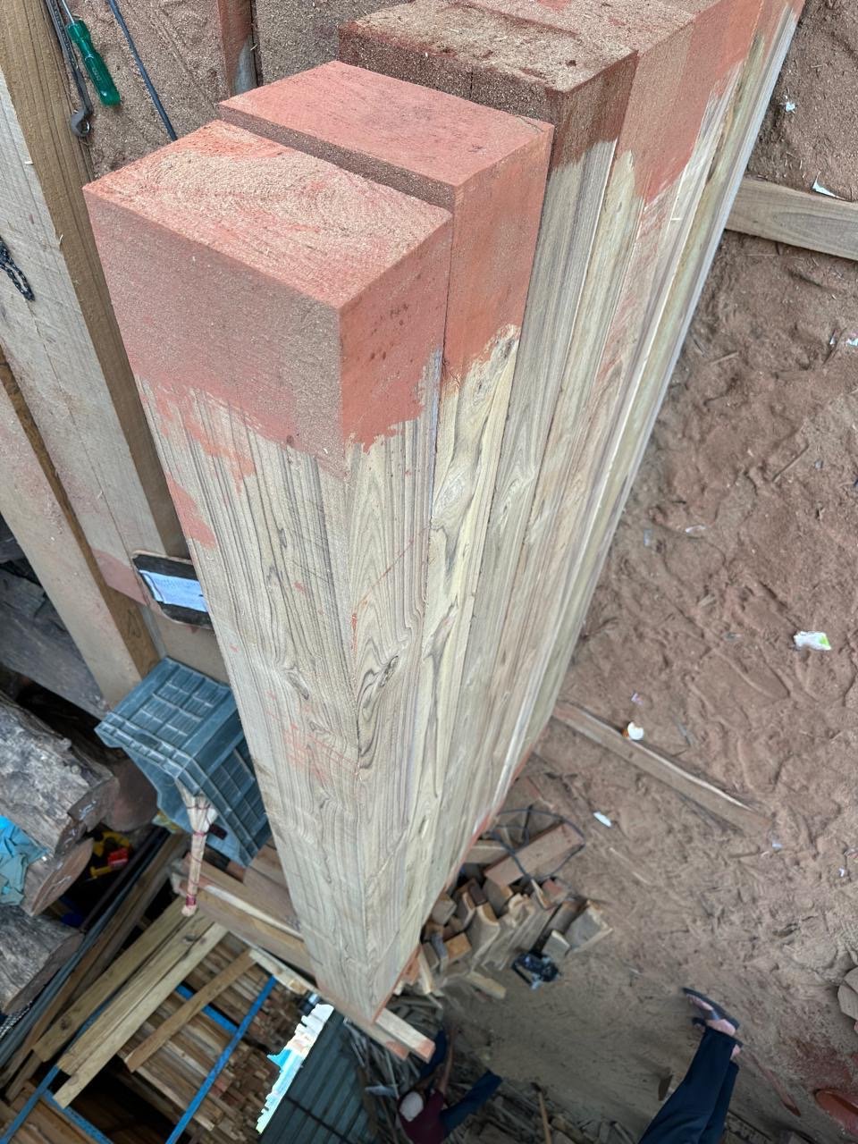 Premium teak beam closeup showing wood grain